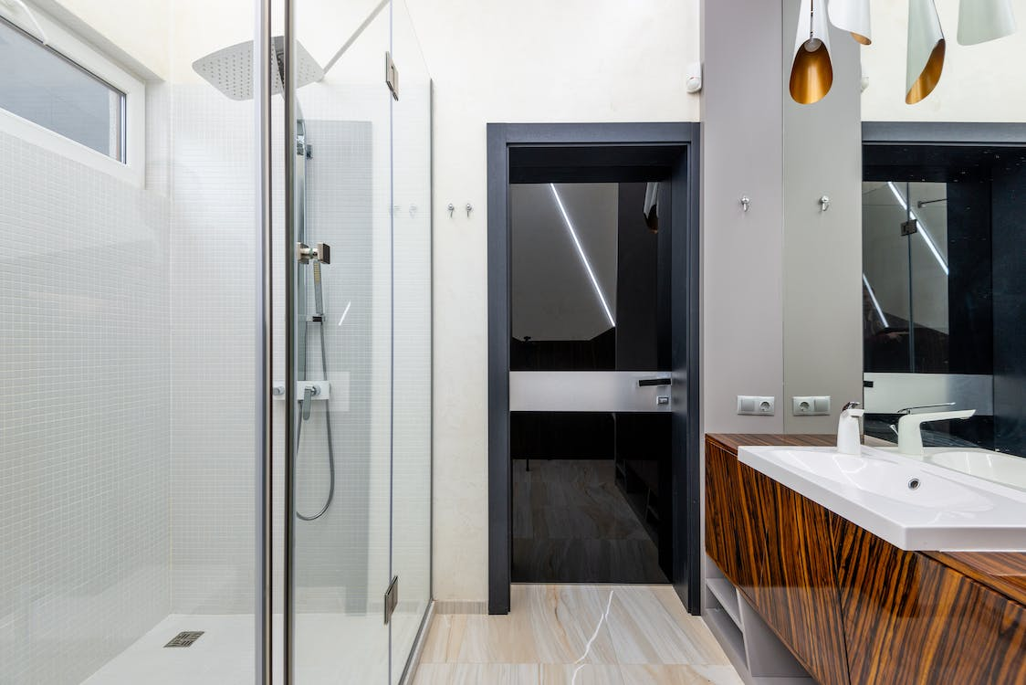 Glass shower enclosure