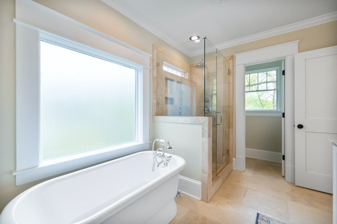 Shower door with knee wall